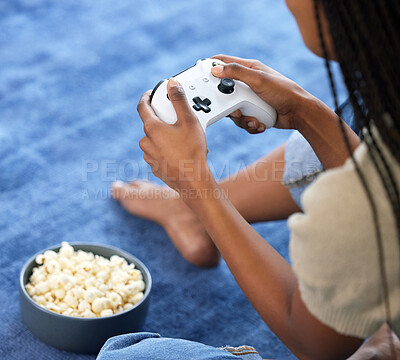 Buy stock photo Woman, video games and hands playing on home floor with popcorn for online gaming, gamepad and relax. Gamer person play on console, joystick or control for esports, streaming and cyber world tech