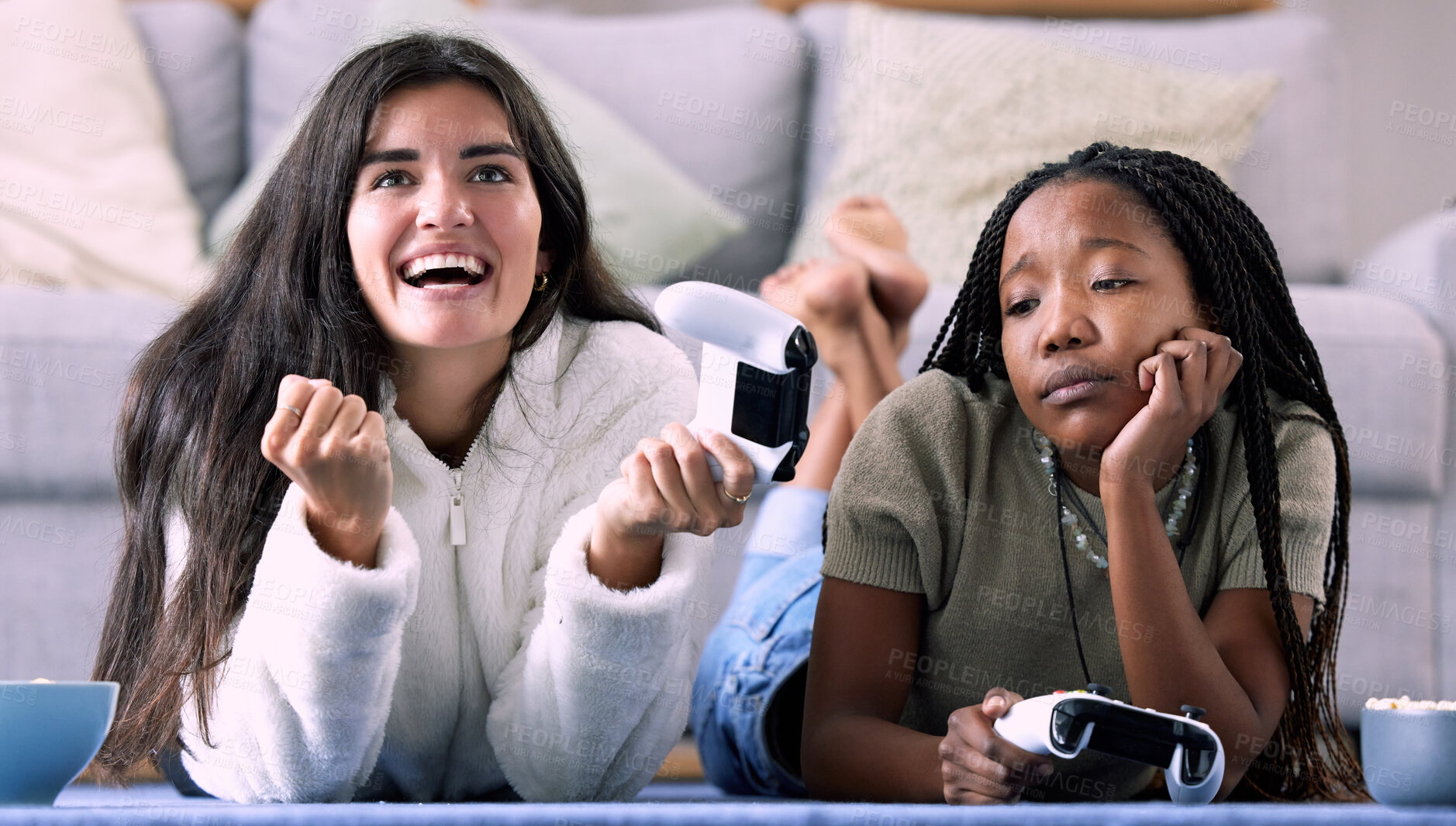 Buy stock photo Gaming, winner and women playing a video game and girl celebrating in a home, house or apartment. Friends, console and people with joystick and jealous person due to victory with controller