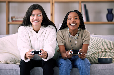 Buy stock photo Friends, women on sofa and video games for quality time, relax or happiness on break, competitive or multiplayer app. Female gamers, ladies or controllers for esports, fun or entertainment with smile