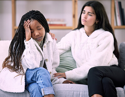 Buy stock photo Sad, friends and empathy with women on sofa in living room for comfort, grief and depression. Mental health, emotional support and care with girl consoling at home for solidarity, advice and worry