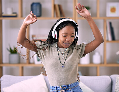 Buy stock photo Black woman, dancing and music headphone in home living room with energy and wifi connection. Young person dance while listening to audio, sound and radio or podcast for freedom, motivation and relax