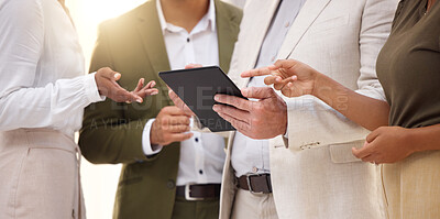 Buy stock photo Hands, tablet and collaboration with a business team working on research together in their office. Teamwork, meeting or planning with a man and woman employee group discussing strategy at work