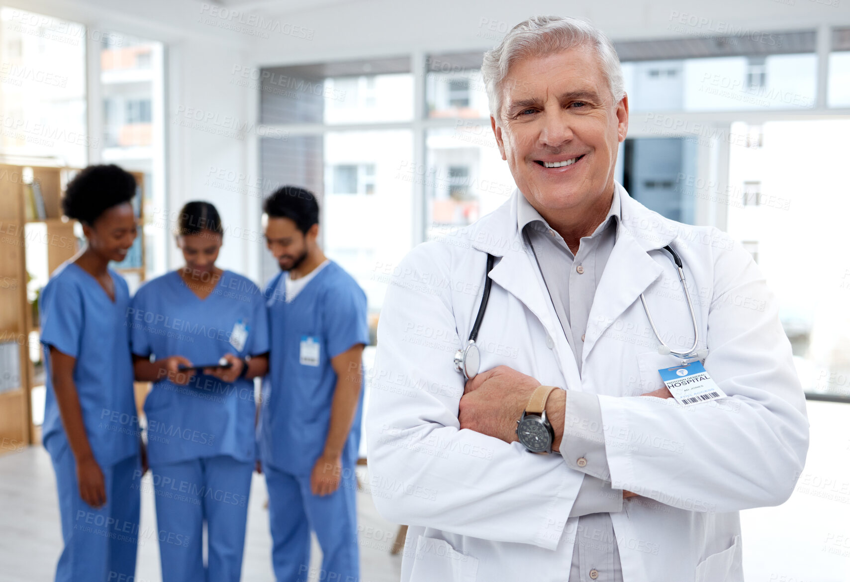 Buy stock photo Senior, doctor and man at hospital, leadership and healthcare with smile in portrait, cardio surgeon and arms crossed. Medical professional, cardiovascular health and male, happy and team leader