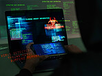 Cybersecurity, fraud and hands on a laptop and phone while programming or hacking a website. Scam, cyber attack and man hacker coding on a computer to steal information or data technology in the dark