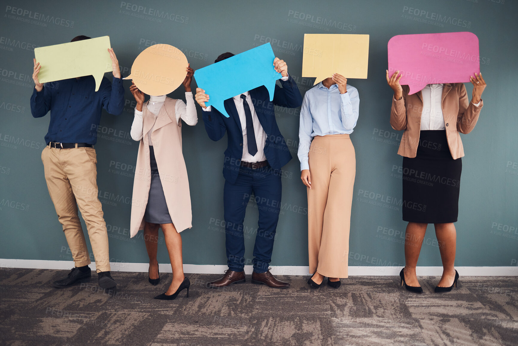 Buy stock photo Business people, speech bubbles and communication in workplace, logo and feedback against grey wall. Group, staff and teamwork for advertise campaign, opinion and announcement with banner or creative