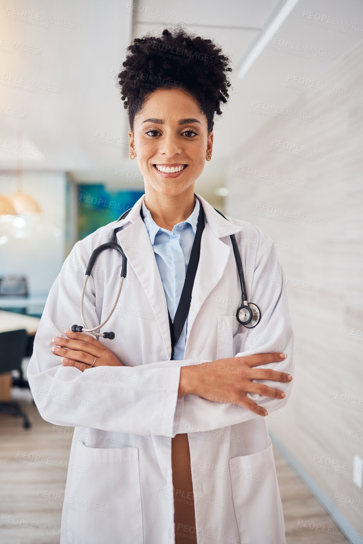 Buy stock photo Portrait, black woman and doctor arms crossed, healthcare and smile in hospital, leader and confident. Face, African American female surgeon, employee or medical professional with skills or happiness