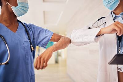 Buy stock photo Covid, elbow or greeting with a doctor and nurse in a hospital working as a team for healthcare. Teamwork, medical and rules with professional medicine colleagues at work in a clinic during corona