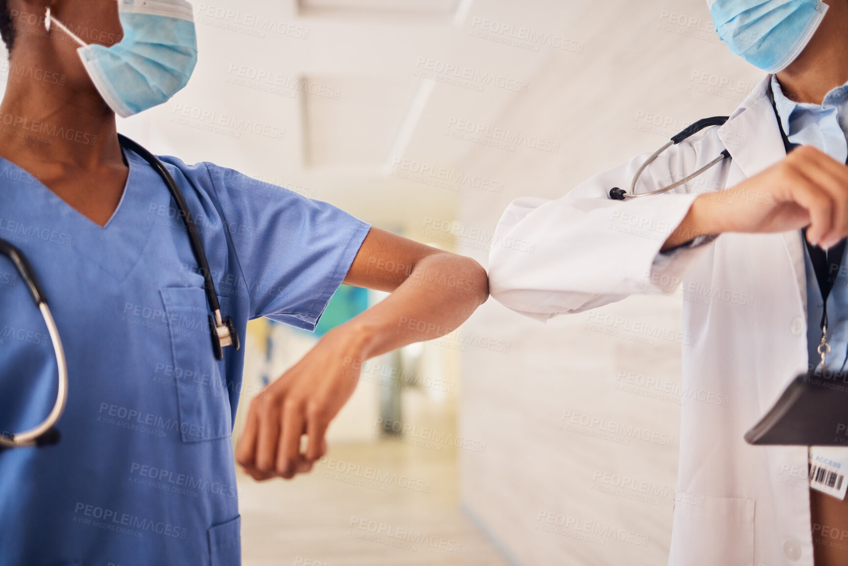 Buy stock photo Covid, elbow or greeting with a doctor and nurse in a hospital working as a team for healthcare. Teamwork, medical and rules with professional medicine colleagues at work in a clinic during corona