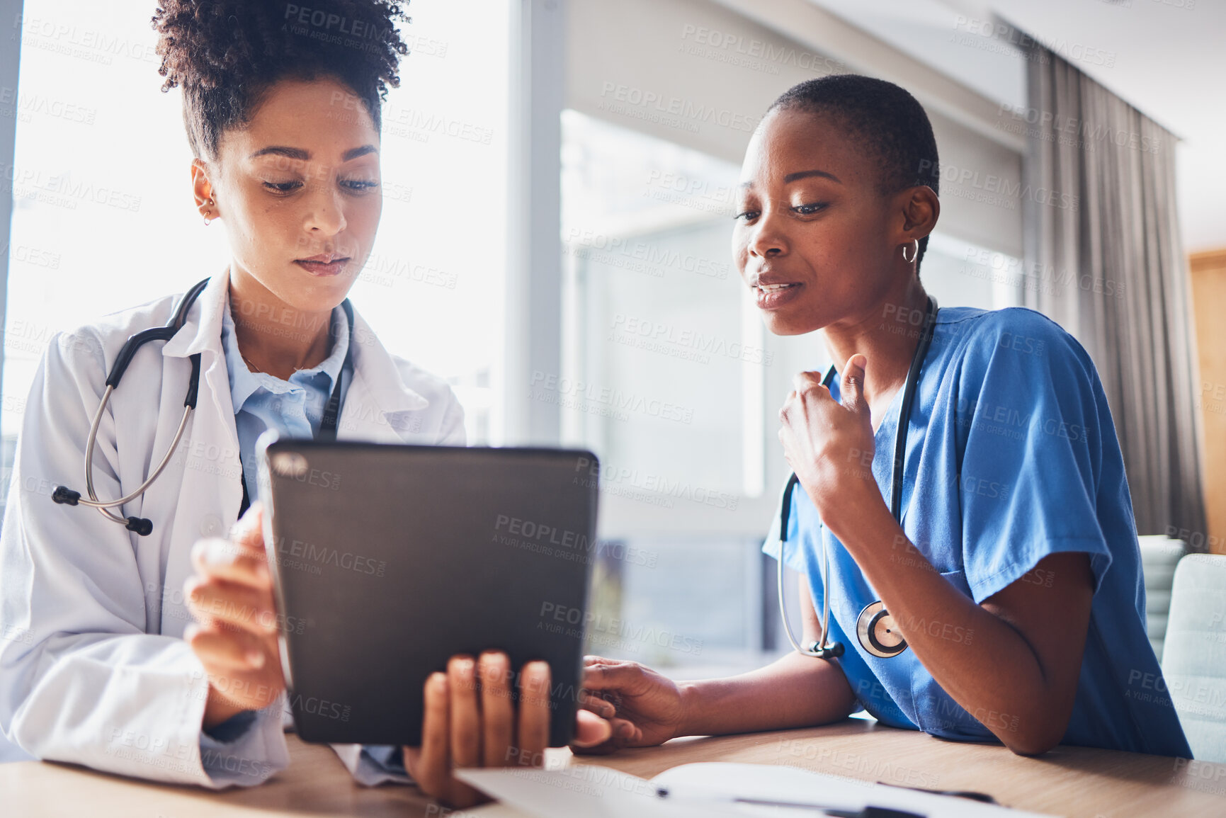 Buy stock photo Tablet, black people or nurses with medical research reading news or tests results in hospital together. Teamwork, digital tech or African doctors planning or speaking of healthcare report on website