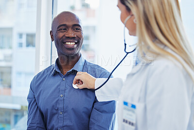 Buy stock photo Patient, doctor woman and consultation with stethoscope in hospital for cardiology or health insurance. Black man and healthcare person talking about lungs, breathing and advice for healthy heart