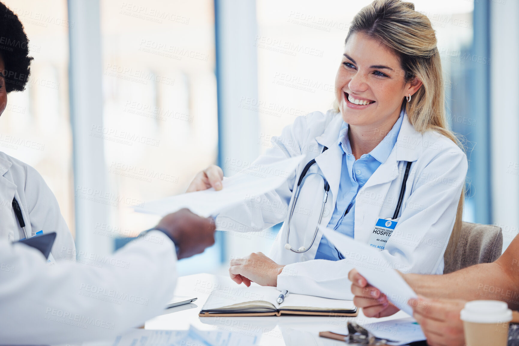 Buy stock photo Healthcare, doctors and woman with smile, documents and meeting for planning, admin and conversation. Medical professional, female employee and coworkers with forms, feedback and reports in hospital