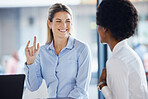 Collaboration, meeting and hand gesture with business women in the office, working on a project together. Teamwork, planning or shaka sign with a happy female employee and colleague talking at work