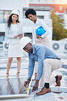 Black man, engineer team and solar panel with construction worker technician outdoor. Businessman, renewable energy staff and industrial eco friendly panels of maintenance employee and handyman