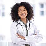 Doctor, black woman and smile portrait for healthcare with life insurance in hospital for wellness. Face of happy medical professional with arms crossed with pride for career, motivation and medicine