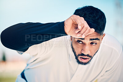 Buy stock photo Tired, sweat and baseball man at a field for training, break and breathing after game fatigue. Athletic, sports and indian guy stop to breathe after exercise, workout or match practice