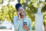 Black woman, phone communication and morning outdoor with blurred background and laughing. Smile, networking and business employee on a work break on a mobile conversation and discussion by trees