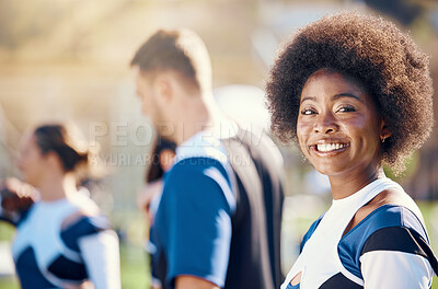 Buy stock photo Happy, sports and portrait of a black woman at cheerleading, rehearsal and team practice. Smile, cheerful and African cheerleader at a sport event, competition or performance with a squad on a field