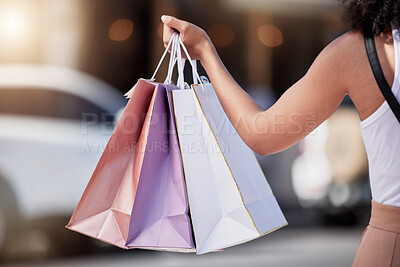 Buy stock photo Woman, hands and holding shopping bags in city street, road or relax urban for sales, deals or commerce discount. Customer, consumer and retail person with gifts, promotion present or fashion parcel