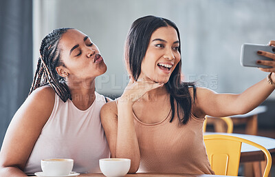 Buy stock photo Women friends, coffee shop and smartphone for selfie, happy or solidarity with beauty on social network. Gen z black woman, phone and relax in cafe for blog, profile picture or photography on web app