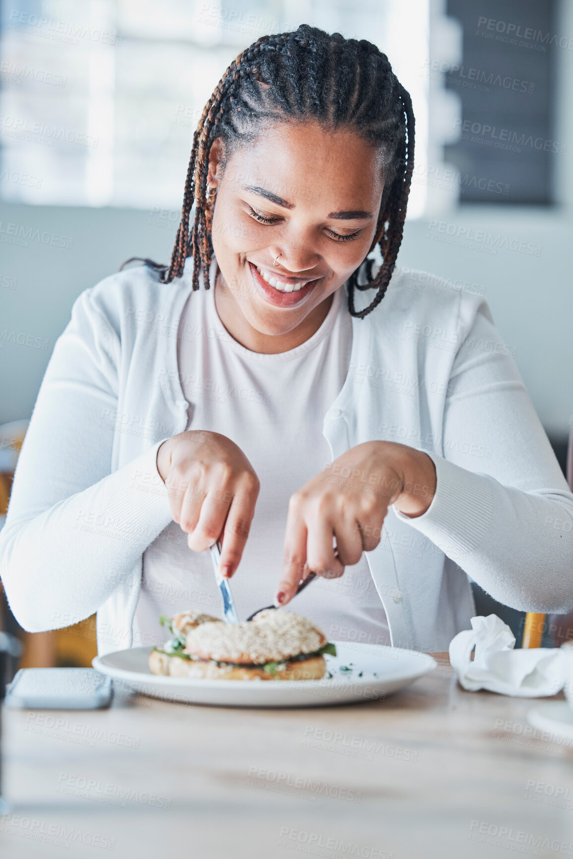 Buy stock photo Black woman eating sandwich at restaurant for customer services or experience of breakfast or lunch. Black person or consumer and bagel, burger or food at small business cafe or cafeteria for review 