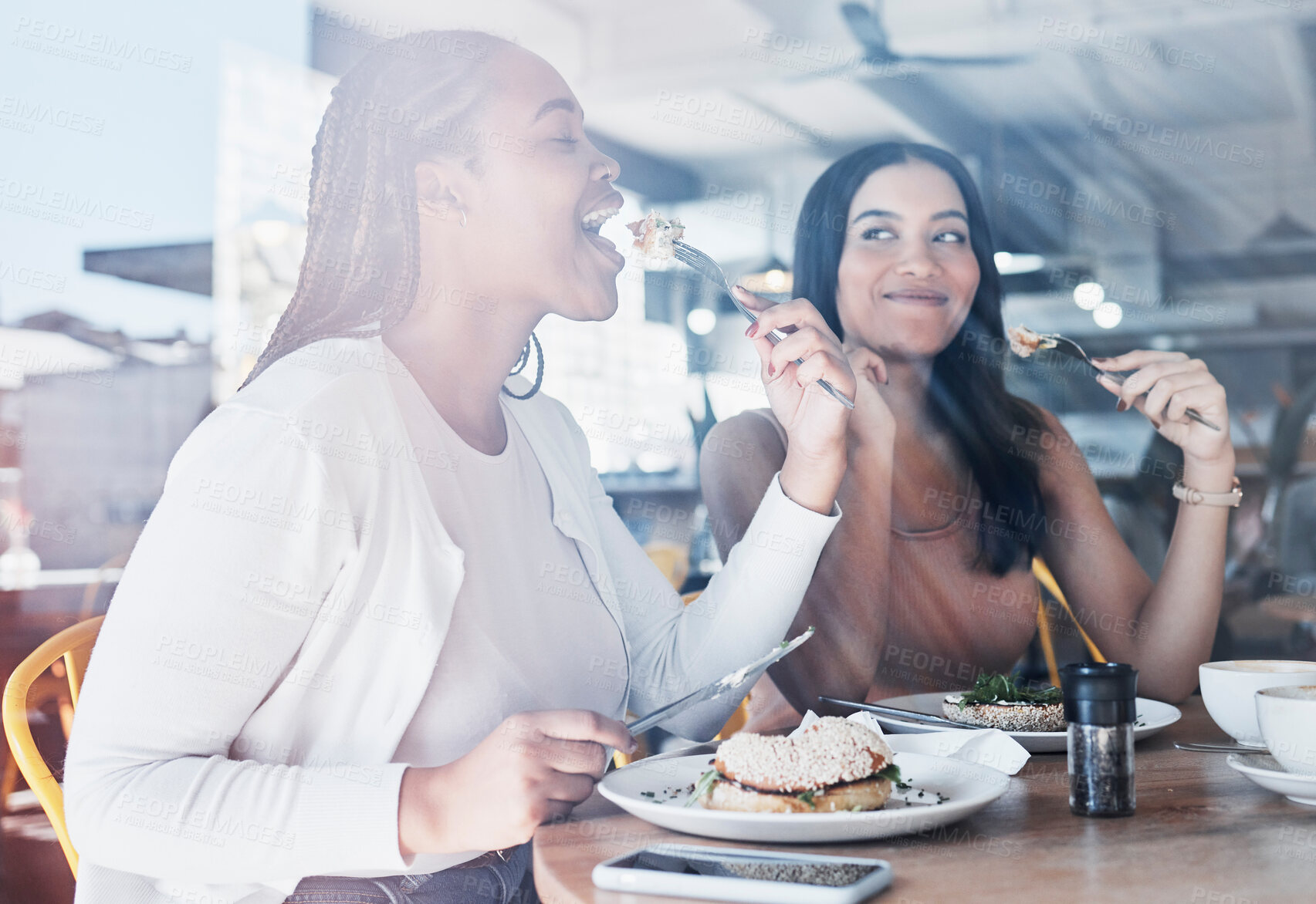 Buy stock photo Food, friends and smile, women in cafe eating together on lunch date on fun summer weekend. Friendship, social and hungry people, girl and friend in restaurant or coffee with sunshine and sandwich.