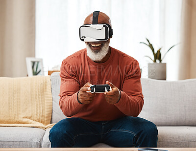 Buy stock photo Vr, gaming and senior black man in virtual reality in home on sofa in living room, laughing and having fun. 3d metaverse, esports gamer and happy retired male playing futuristic games with controller