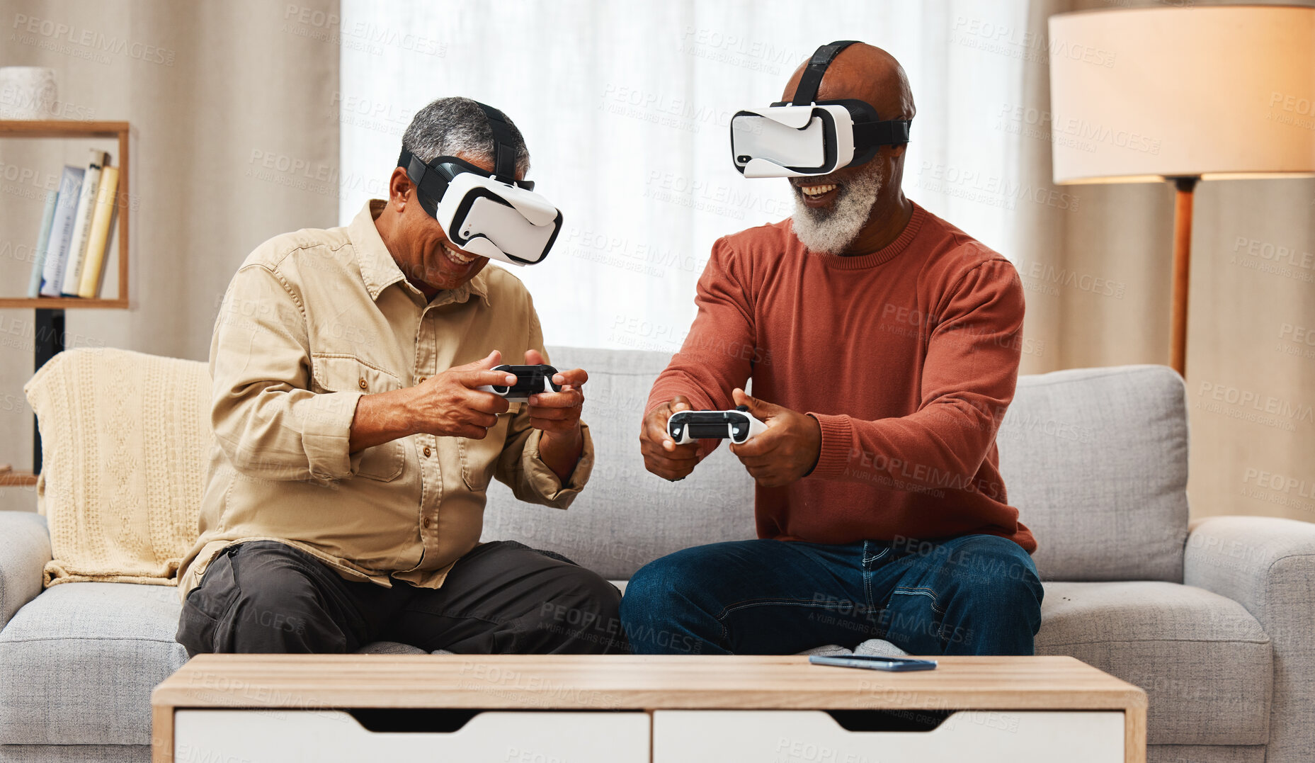 Buy stock photo Vr, friends and senior men gaming in home on sofa in living room while laughing at meme. 3d technology, metaverse gamer and smile of happy retired people playing futuristic games with controller.