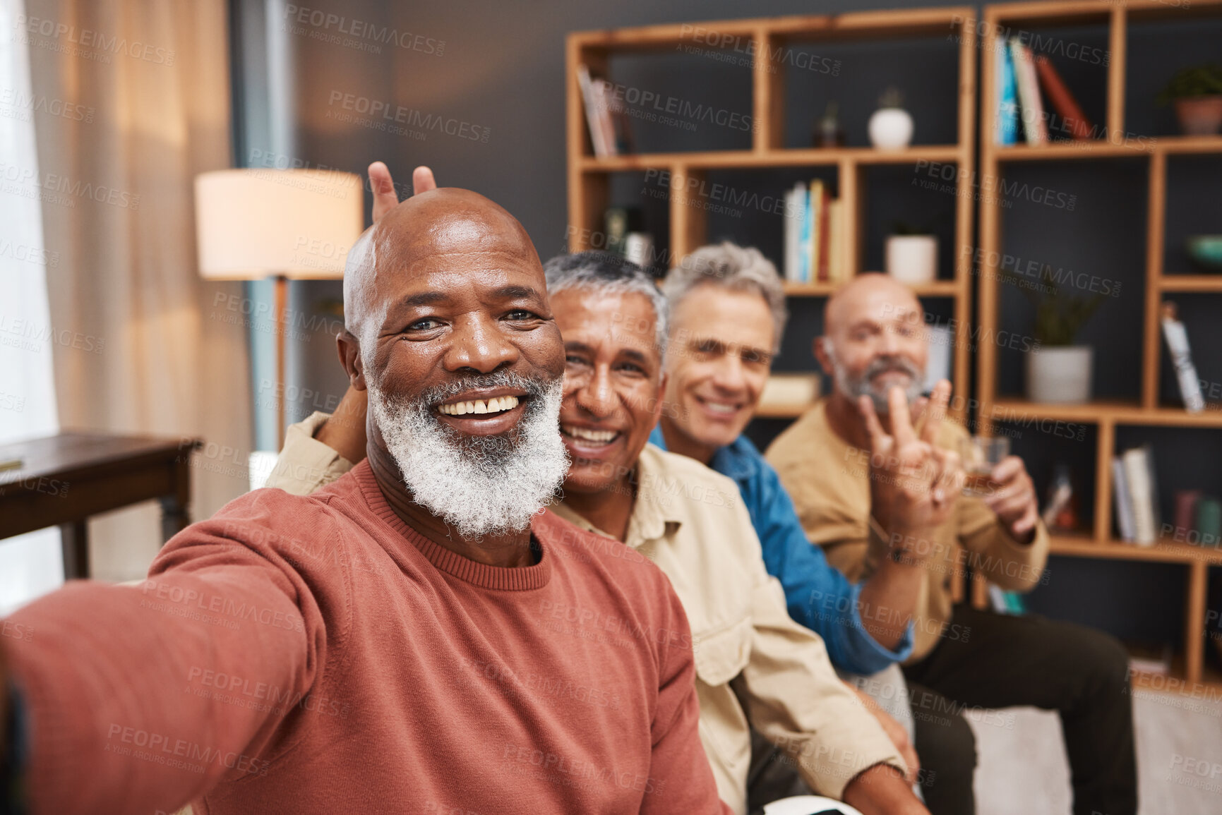 Buy stock photo Portrait selfie, peace sign and black man with friends in house, having fun and bonding together. V emoji, retirement face and happy elderly group of men laughing and taking pictures for social media