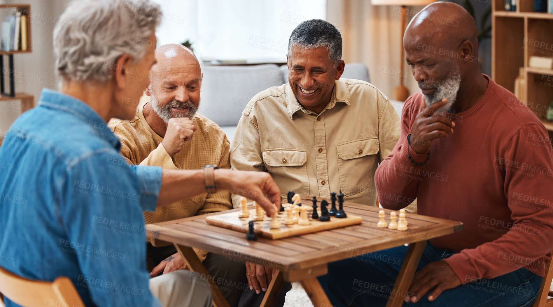 Buy stock photo Chess, friends and board games on wooden table thinking of strategic or tactical move at home. Senior group of men playing and holding or moving white piece for attack in game of skill and tactics