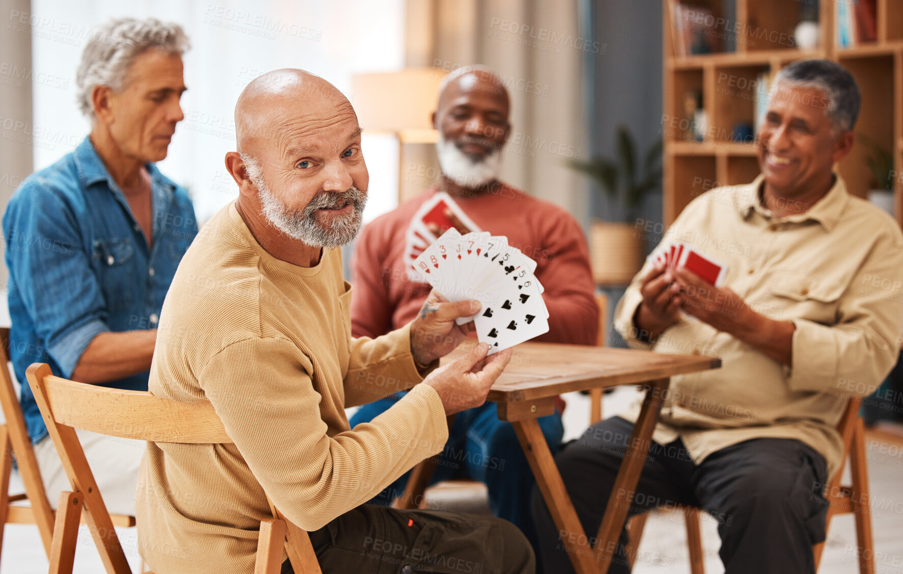 Buy stock photo Showing, portrait and senior friends with cards for a game, playing and bonding in a house. Smile, show and elderly group of men in a nursing home for poker, games and competitive for fun together