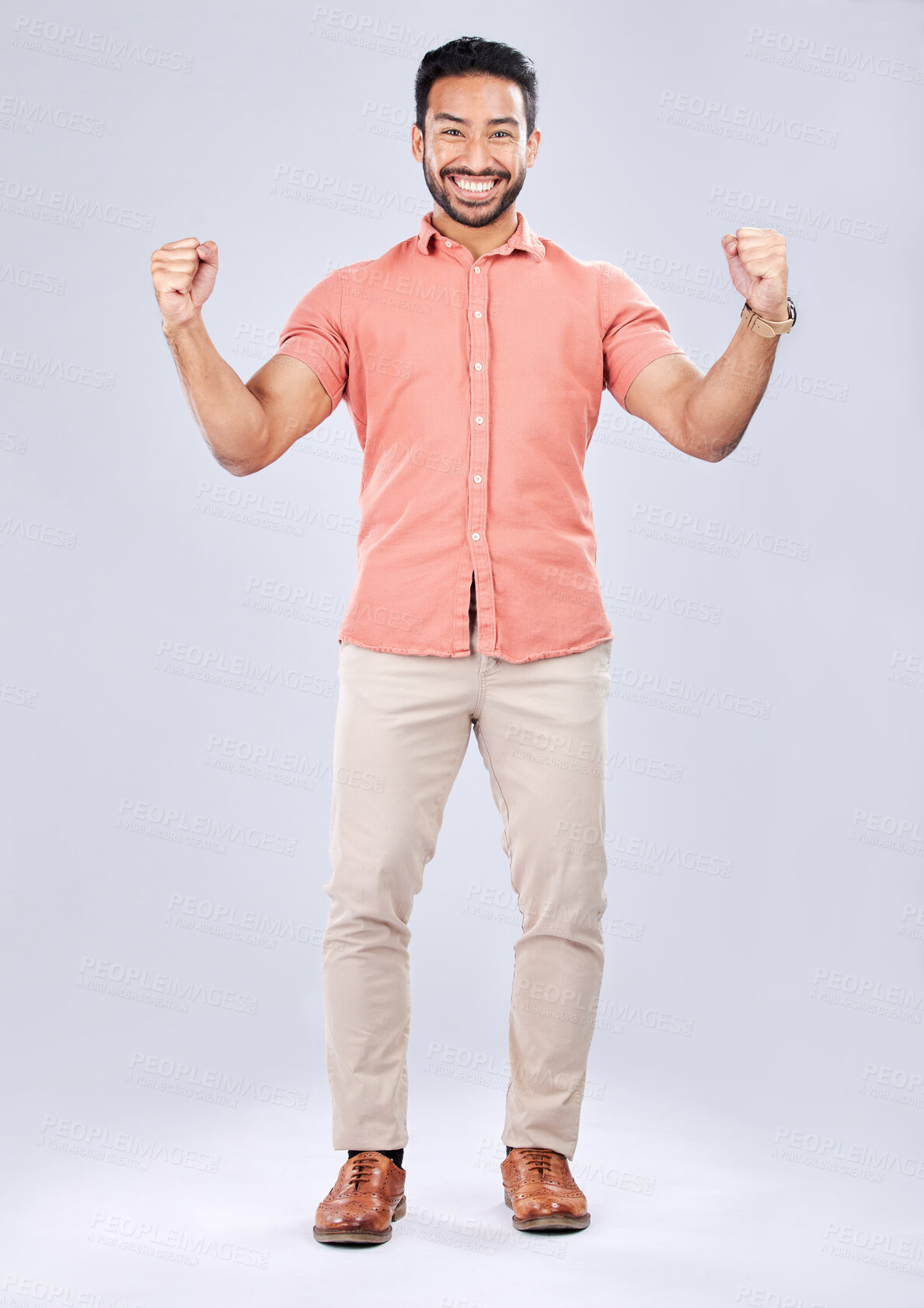 Buy stock photo Business man, portrait and excited about winning, champion and success, cheers on studio background. Yes, fist pump and happiness with young male, professional win and promotion with bonus or reward