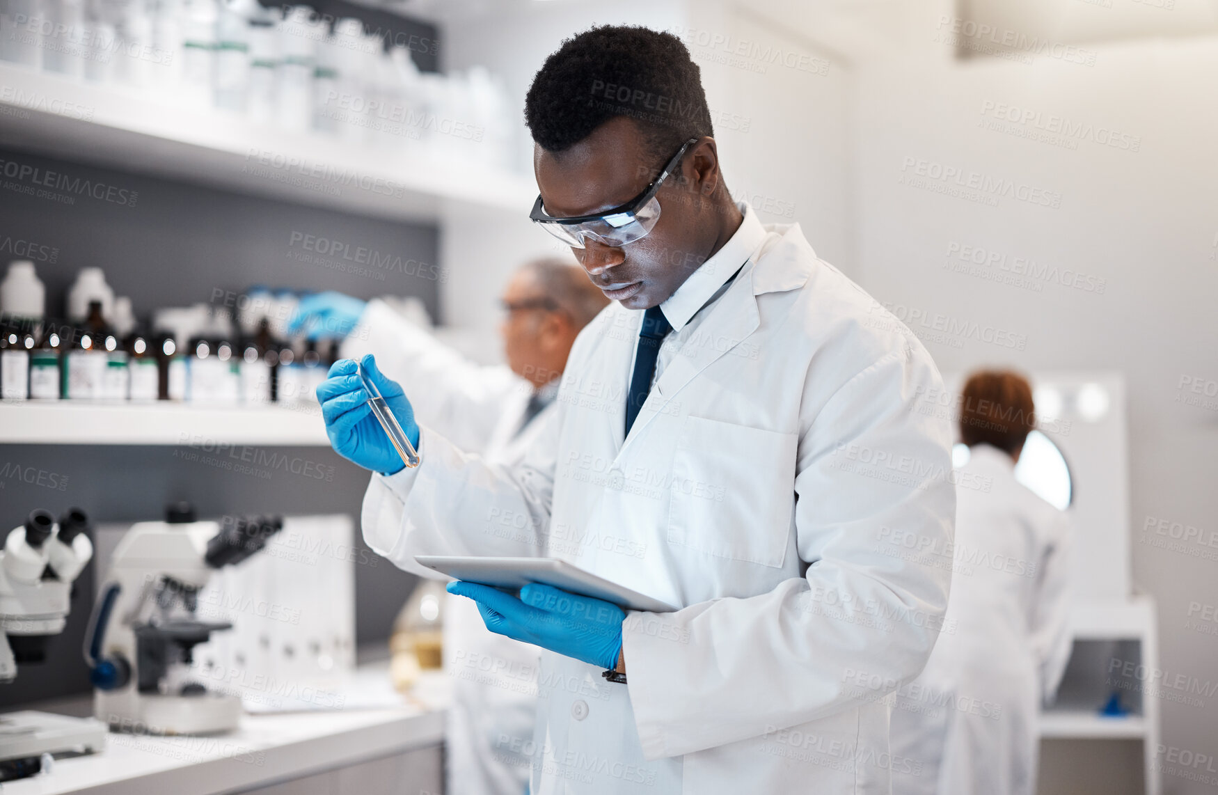 Buy stock photo Science, research and black man in laboratory with tablet for medical analysis and digital innovation in medicine. Pharmaceutical analytics, web and scientist in South Africa checking results online.