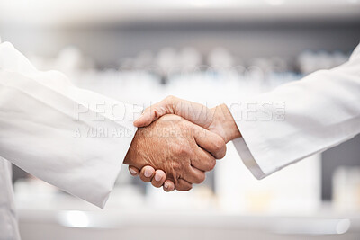 Buy stock photo Closeup, handshake and doctors with collaboration, research and partnership for healthcare. Zoom, hand and scientists with agreements, teamwork for wellness or update for data analytics in laboratory