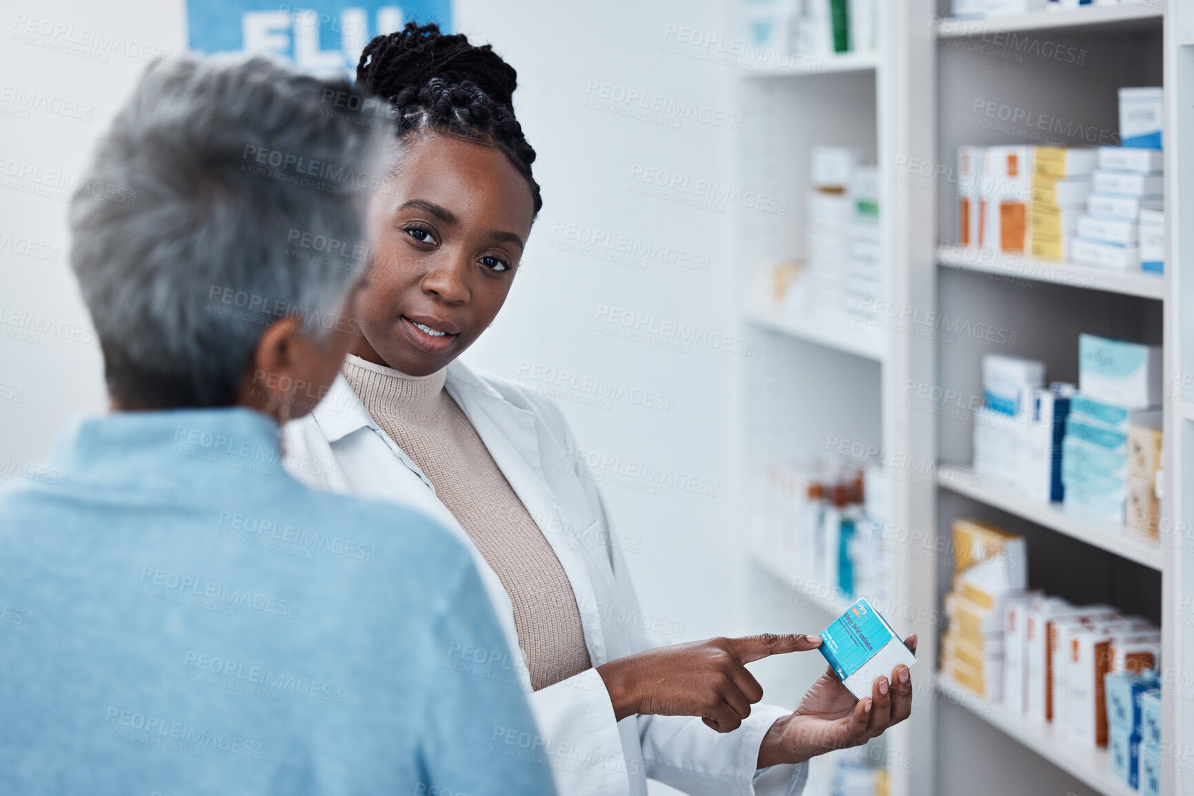 Buy stock photo Pharmacy, black woman pharmacist and elderly patient with medication discussion of side effect. Medical clinic, doctor and pharmaceutical drugs with a healthcare, wellness and health employee at work