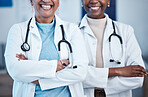 Black women, doctors and healthcare workers with happiness and solidarity in a hospital. Medical care, support and teamwork of a healthcare, wellness and health team in a clinic ready for management