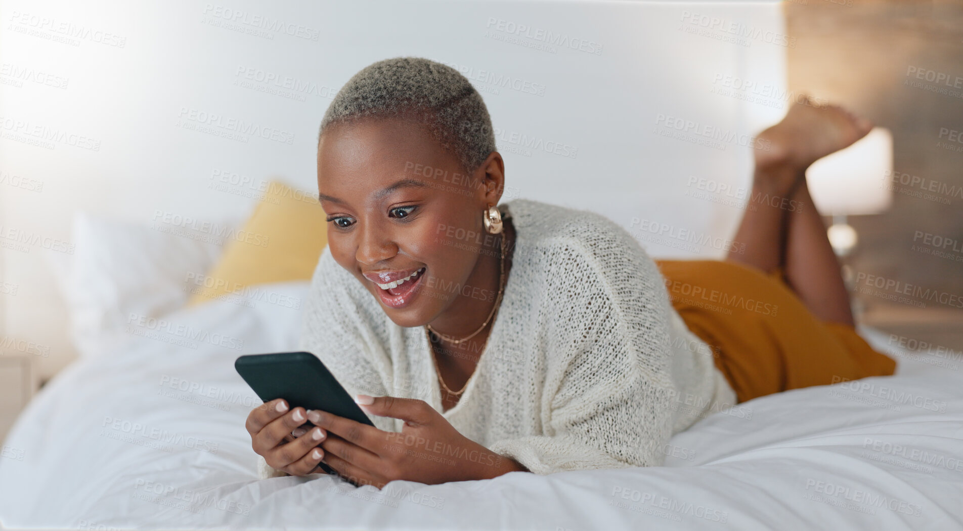 Buy stock photo Phone, bedroom surprise and black woman reading online shopping news, omnichannel discount or announcement. Cellphone, home bed and social media user with wow mobile app, notification or web store