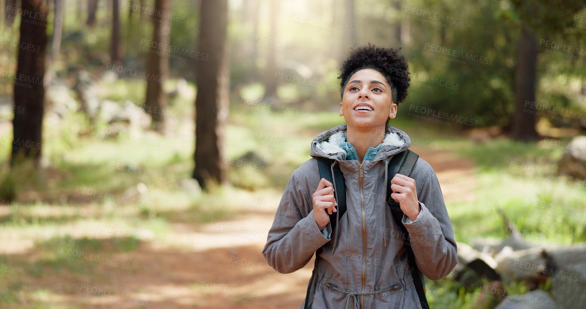 Buy stock photo Thinking, hiking and adventure with a woman in nature, sightseeing or walking on a trail outdoor. Freedom, travel and health with happy african female hiker for discovery, fitness and explore space