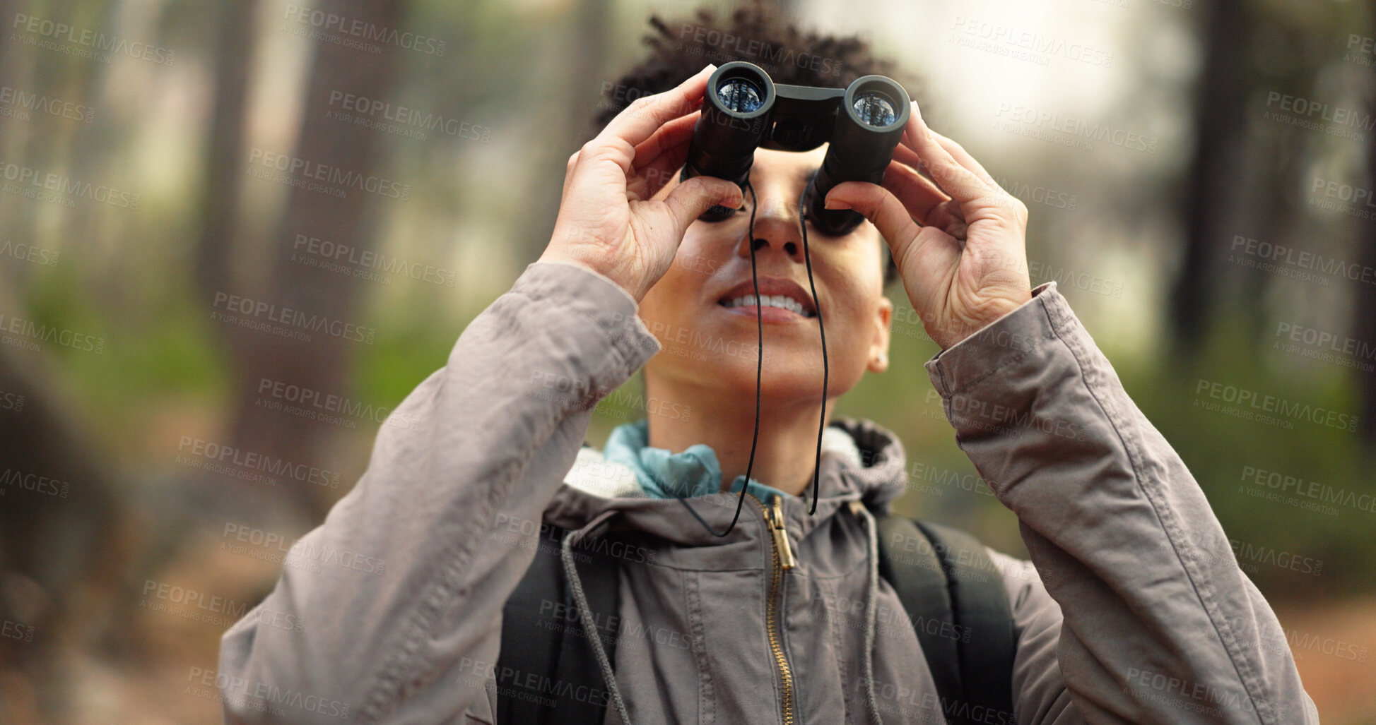 Buy stock photo Binoculars, forest and woman travel in nature, journey and outdoor adventure, hiking and carbon footprint research. Watch, search and person birdwatching in jungle, woods or eco friendly environment