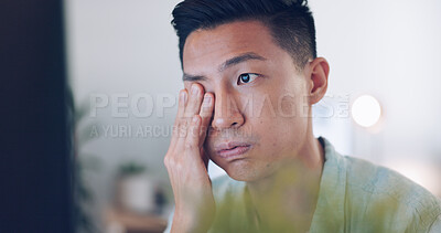 Asian businessman, tired and hand on face in communication office, headache and marketing company. Man, computer or late night reading with burnout, target or kpi at digital marketing agency in Tokyo