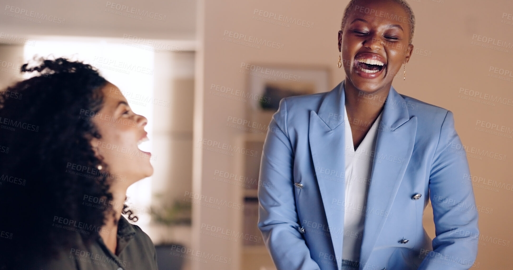 Buy stock photo Funny, office and business women laughing at night for comic conversation, joke and humor. Collaboration, teamwork and happy workers in discussion, talking and chat for overtime schedule on break