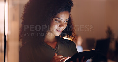 Office, night and happy black woman on a phone at her job in the dark smiling about funny text. Business, technology and social media mobile app scroll of a person working late on a work break