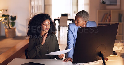 Documents, collaboration and talking with a business woman team working in their office at night. Teamwork, conversation and training with a female employee explaining a report to a colleague