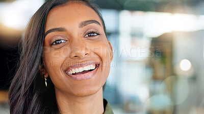 closeup portrait of happy, beautiful young woman smiling and laughing while looking into camera. Fun, charming attractive female faces with a smile of joy. Expressive lady standing with lovely grin