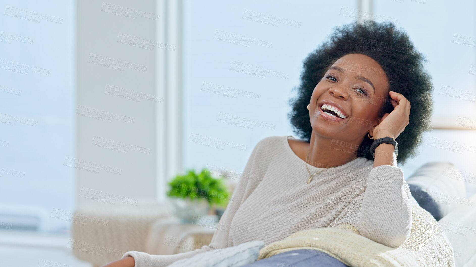 Buy stock photo Portrait, happy and relax with a black woman on a sofa in the living room of her home on the weekend. Face, smile and afro with a young person in her apartment for peace or quiet on a lazy sunday