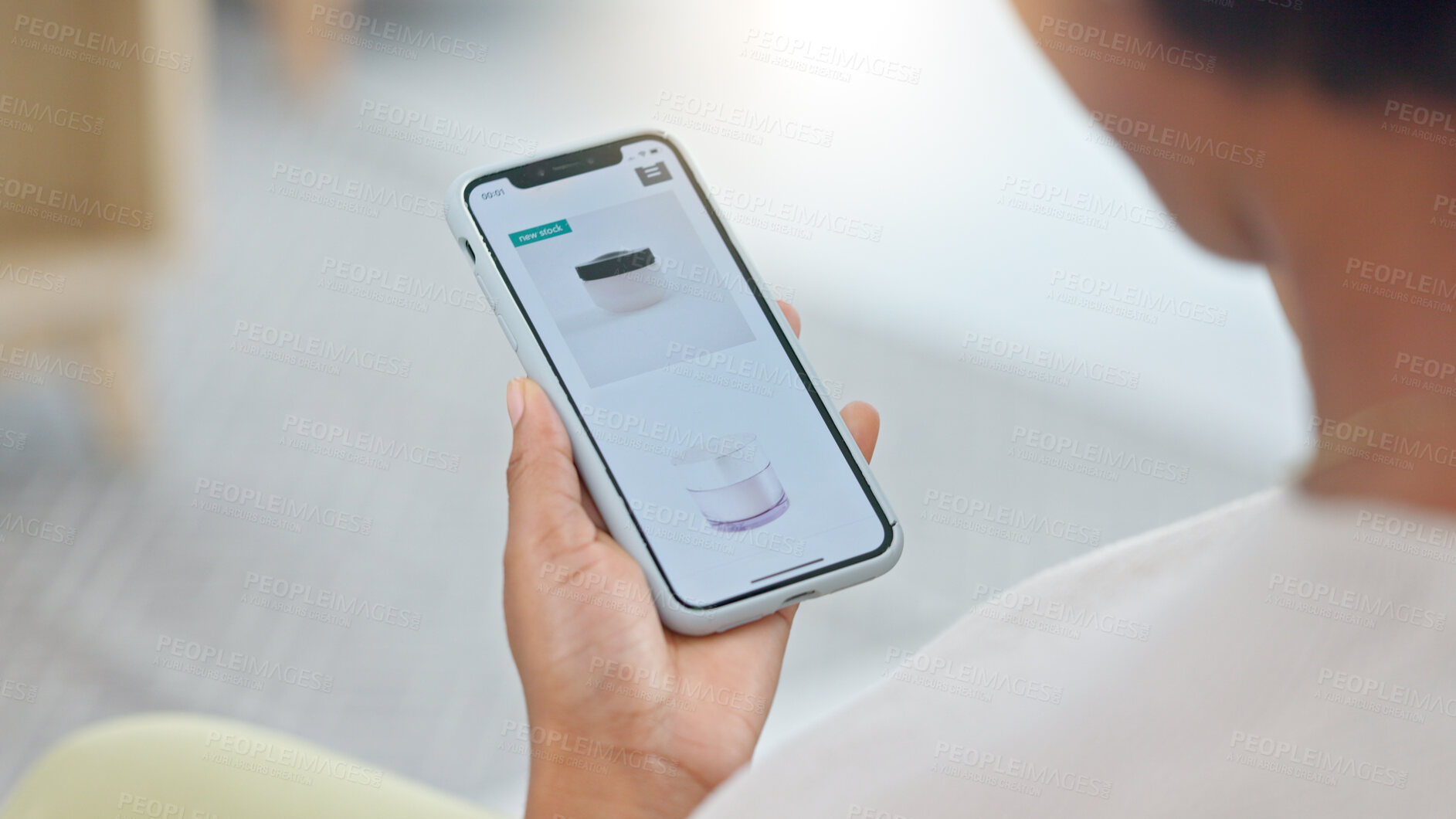 Buy stock photo Person, hands and phone in online shopping, skincare or products on sale or discount at home. Closeup of shopper looking at cosmetics, lotion or cream in ecommerce on mobile smartphone app in house