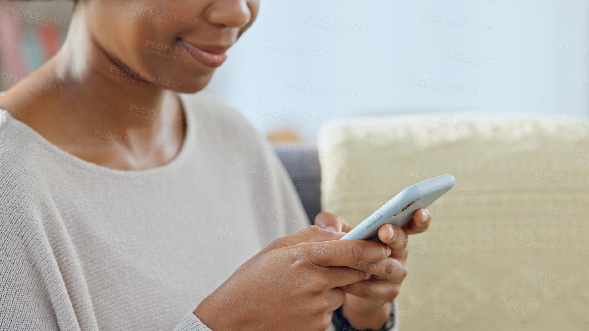 Buy stock photo Woman, phone and hands typing in networking, online communication or social media on sofa at home. Closeup of happy female person chatting, texting or browsing on mobile smartphone app at house