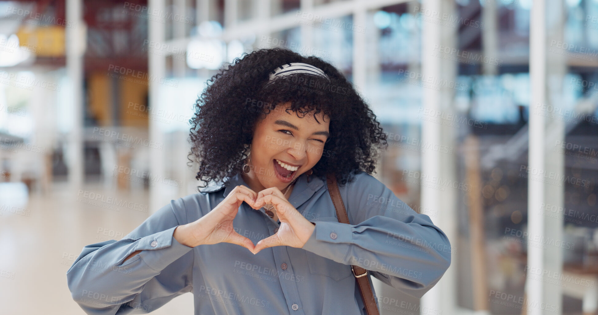 Buy stock photo Heart emoji, face and business woman with wink in modern office, marketing customer support or client branding care. Portrait, happy and love hands gesture for creative designer and Brazil worker