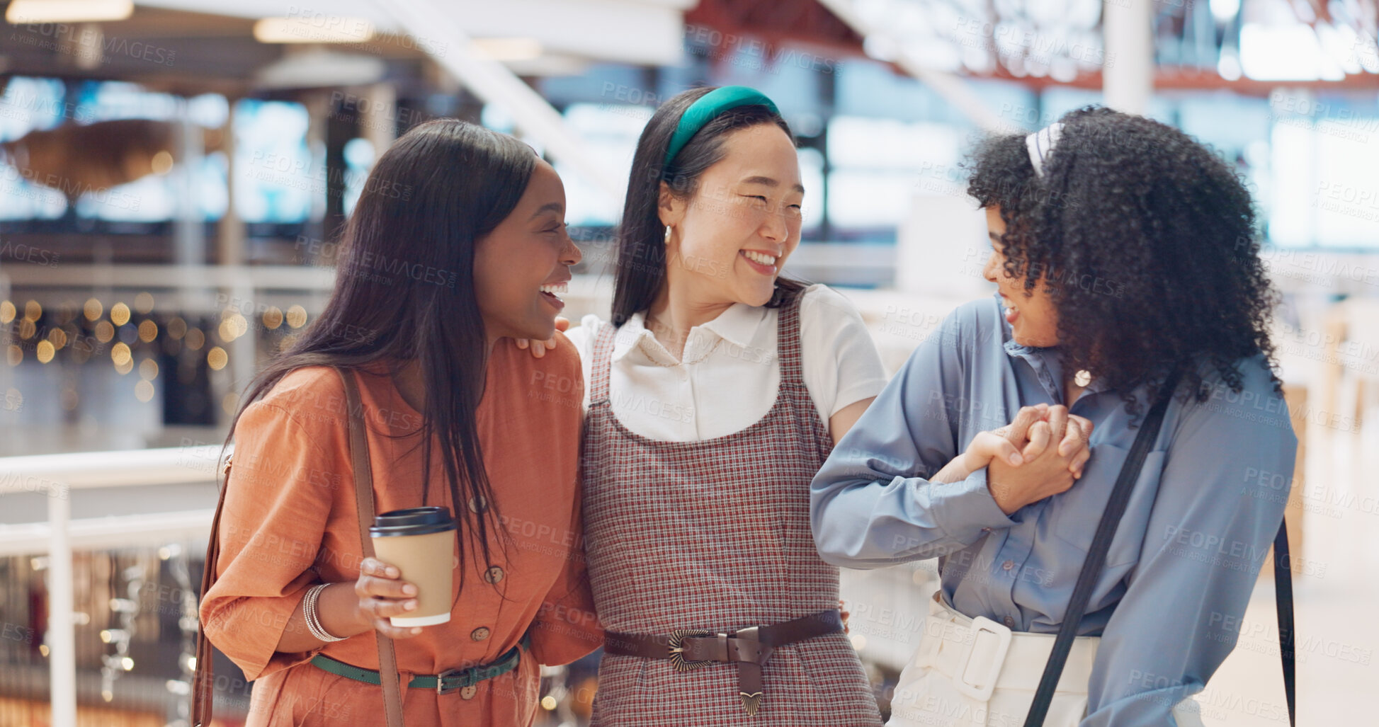 Buy stock photo Coffee, smile and women friends holding hands in a shopping mall for retail on their lunch break together. Diversity, freedom and a group of young people laughing in a store for friendship bonding