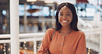 Black woman, happy with face and success in business, employee at modern office in Cape Town and positive mindset. Professional portrait, African and workplace mockup with laughing and work happiness