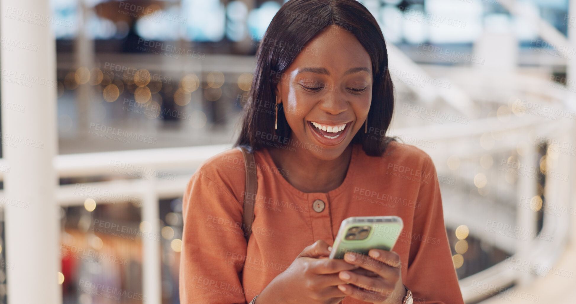 Buy stock photo Happy black woman, laughing or phone in shopping mall on social media, fashion sales website or clothing app. Smile, bokeh or African customer on mobile technology for funny news or online meme joke